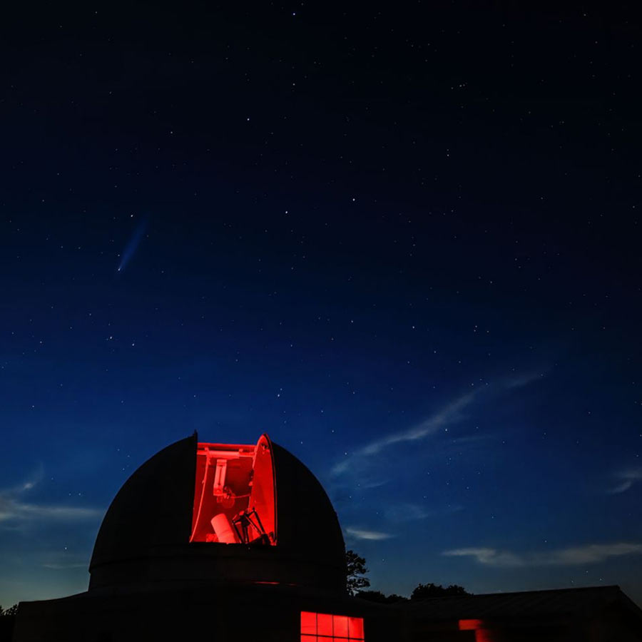 observatory and comet in the sky
