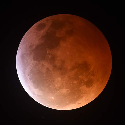 lunar eclipse moon is orange
