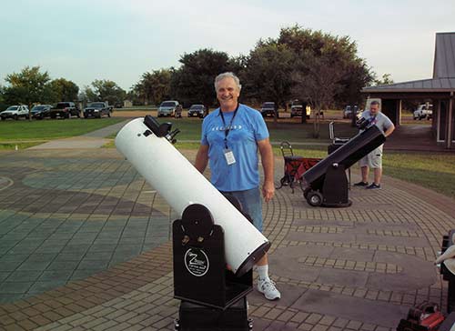 Bracewell and telescope at McNair outreach
