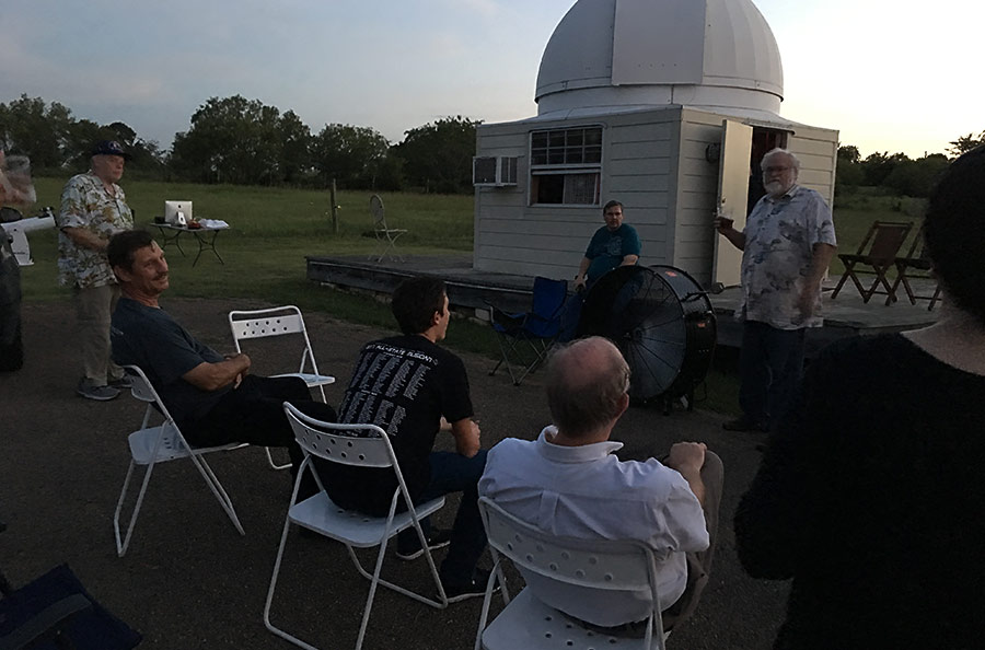 Tim Cowden calls a short business meeting to order before the star party begins.
